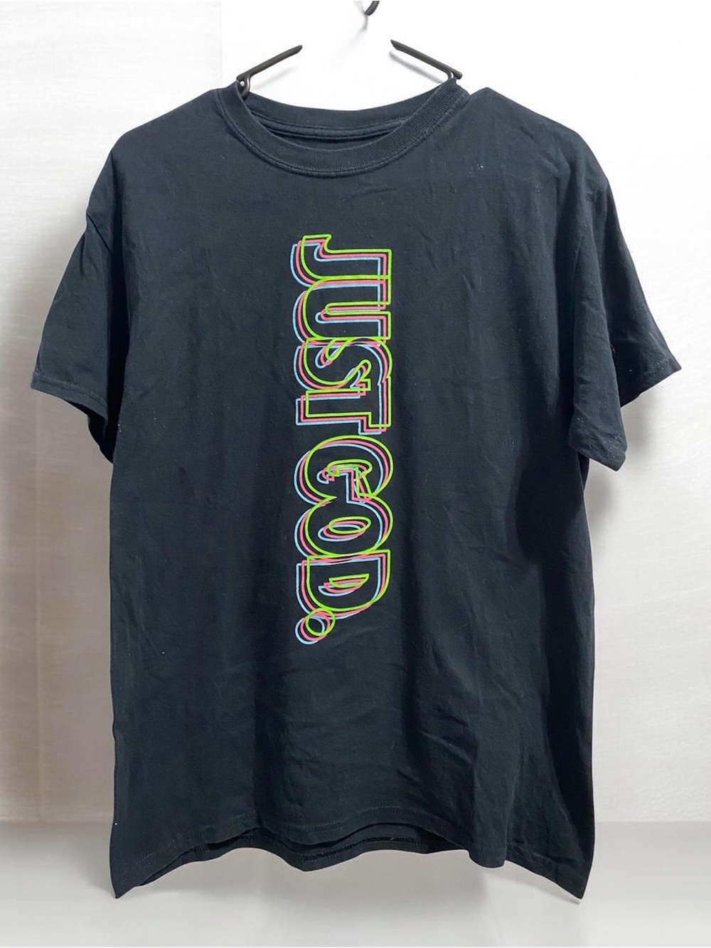 Black Short-Sleeve Tee with Neon Green & Pink Vertical Graphic “JUST GOD”